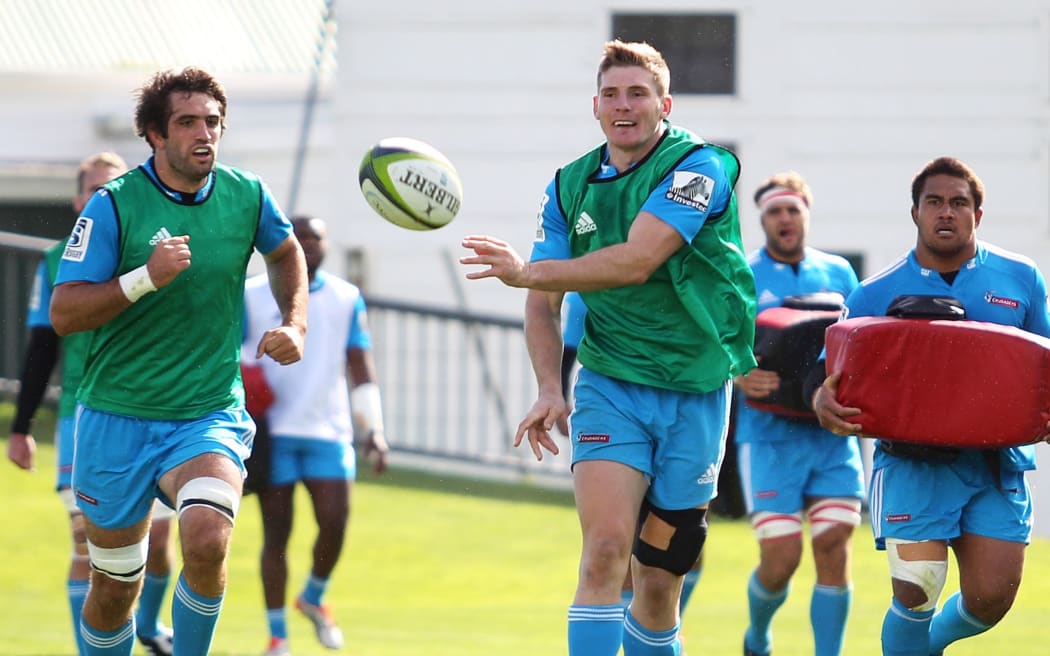 The Crusaders were rocked on Tuesday by news Colin Slade (R) is leaving for France