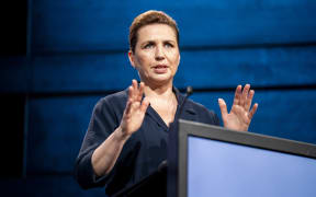 (FILES) Denmark's Prime Minister Mette Frederiksen addresses participants of the 7th annual Copenhagen Democracy Summit at the Royal Danish Playhouse in Copenhagen on May 14, 2024. Danish media reports that PM Mette Fredriksen was assaulted in central Copenhagen on June 7, 2024, allegedly hit in the face, shocked but no serious injuries. (Photo by Ida Marie Odgaard / Ritzau Scanpix / AFP) / Denmark OUT
