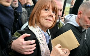 Gisele Pelicot leaves the courthouse after hearing the verdict of the court that sentenced her ex-husband to the maximum term of 20 years jail for committing and orchestrating her mass rapes with dozens of strangers he recruited online, in Avignon on December 19, 2024. - Dominique Pelicot, who had already confessed to the crimes, was earlier found guilty by the court in the southern city of Avignon after an over three-month trial that shocked France and turned his former wife Gisele into a feminist hero. His 50 co-defendants in the case were also convicted by the court, with no acquittals. (Photo by Miguel MEDINA / AFP)