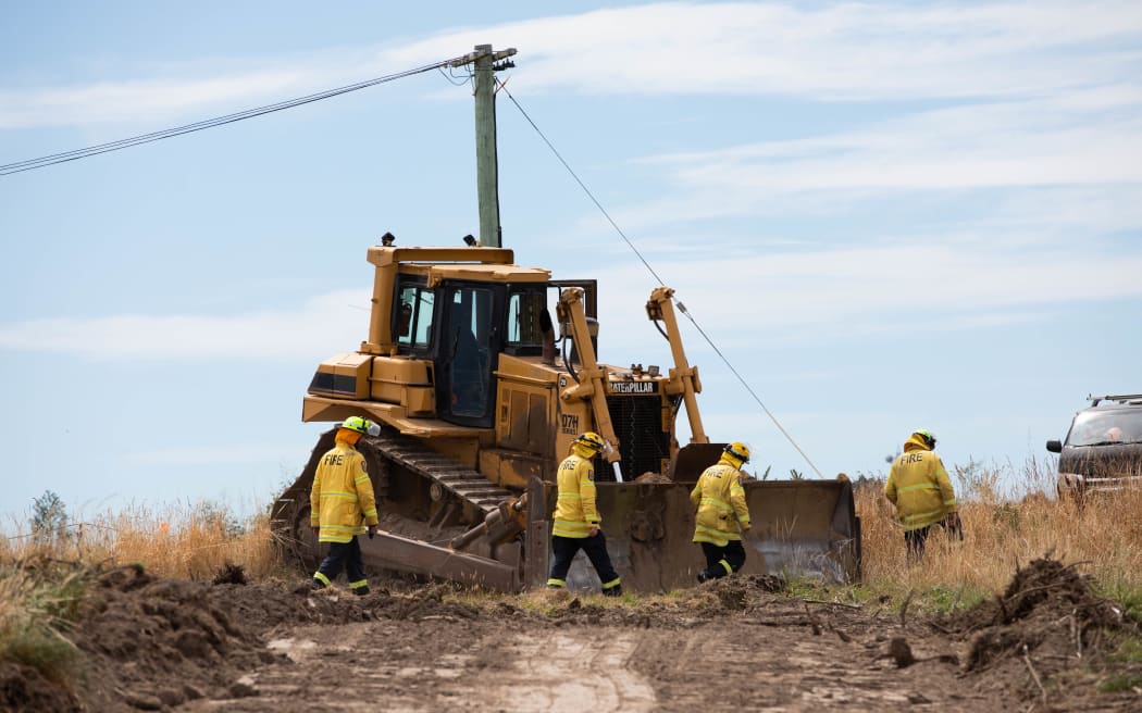 Fire crews battling the Port Hills fire in Christchurch for a second day, on 15 February, 2024.