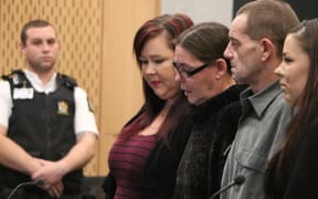 Tracy Duckmanon with supporters in the High Court in Christchurch.
