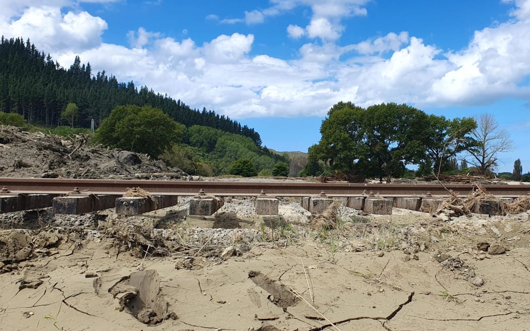 Rail tracks scoured out underneath by the Esk River.