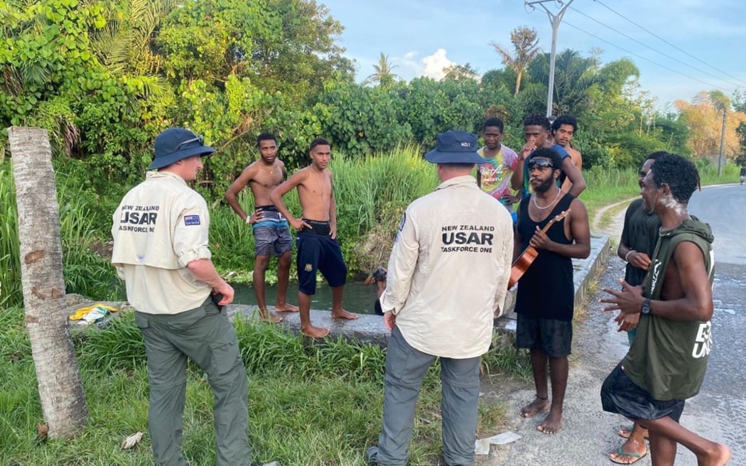 USAR and Vanuatu locals after the Vanuatu quake.