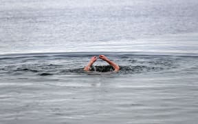 Church members dive into the three degrees Celsius cold water of Schwerin lake during the fifth Russian-Orthodox water sanctification in Schwerin, Germany, 19 January 2017. According to the Gregorian calendar, 19 January is the day of the baptism of Jesus. Photo: Jens Büttner/dpa-Zentralbild/dpa (Photo by JENS BUTTNER / DPA / dpa Picture-Alliance via AFP)