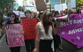 Protesters marched up Queen Street in Auckland.