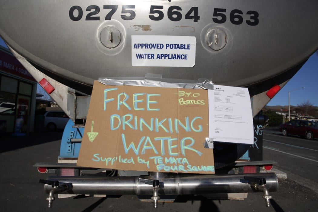One of at least five water tankers set up around the town.