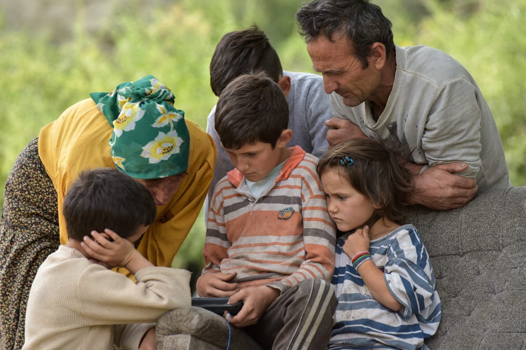 Hatidze Muratova with members of the Sam family, including Hussein (right).