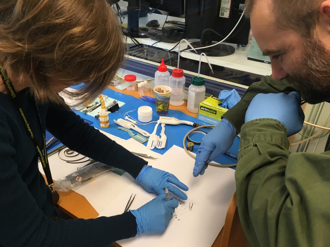 Andrea Bubendorfer and Andrew Best work on MicroMaker