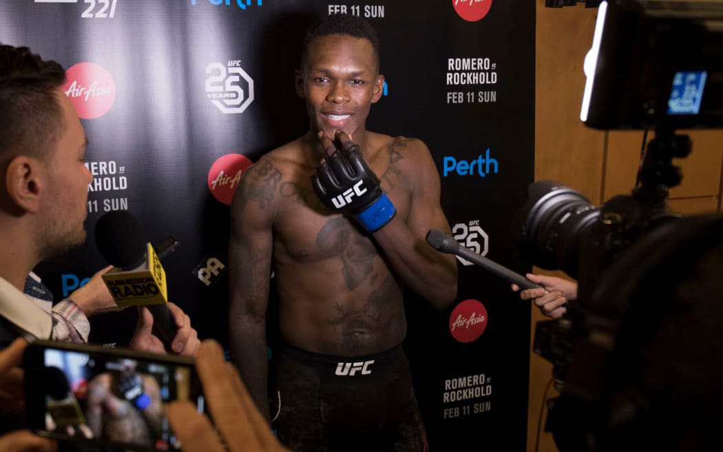 Israel Adesanya is as comfortable in front of a mic, as he is in the middle of a octagon.
