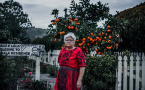 Liliani Waigth outside her garden, named Kolokakala.