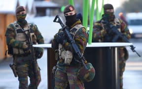 Soldiers patrol the streets of Brussels as the city remains on high alert