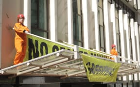 Protesters at the headquarters of mining lobby group Straterra, September 2024.