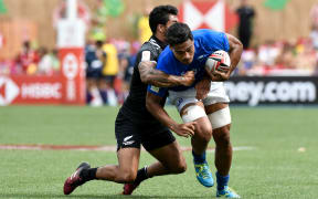 Gordon Langkilde is tackled during a World Series match against New Zealand.