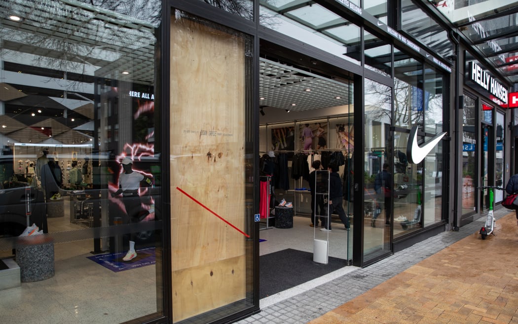 A window is boarded up at a Nike store in Cashel Street Christchurch after a burglary in the early hours of 14 July 2024.