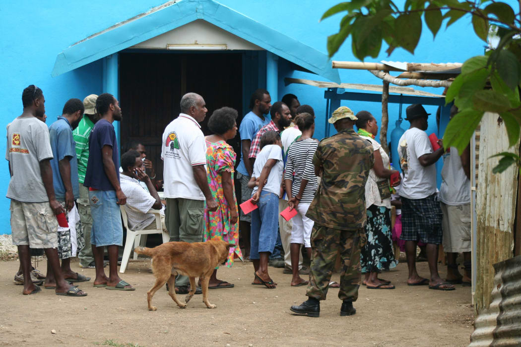 Voters queue at an Efate polling station,  Vanuatu election 2012.