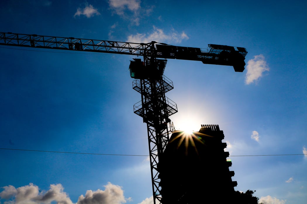 Cranes dot the skyline in Papua New Guinea's bustling capital Port Moresby.