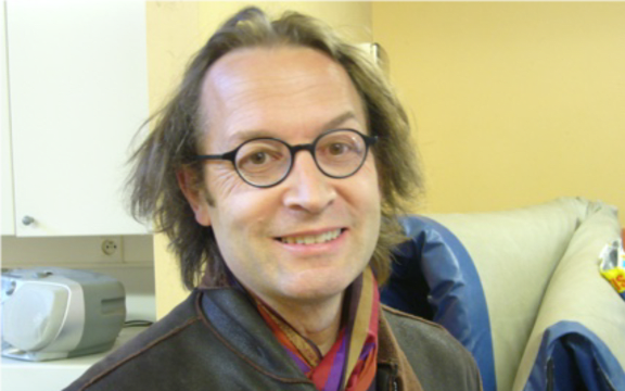 publicity shot of Belgian composer Denis Bosse
