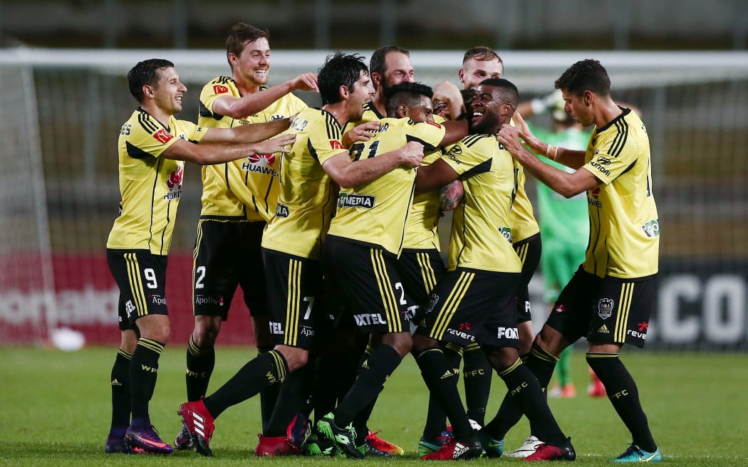 Phoenix players celebrate a Vince Lia goal.