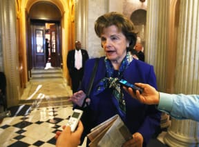 Dianne Feinstein speaking to reporters.