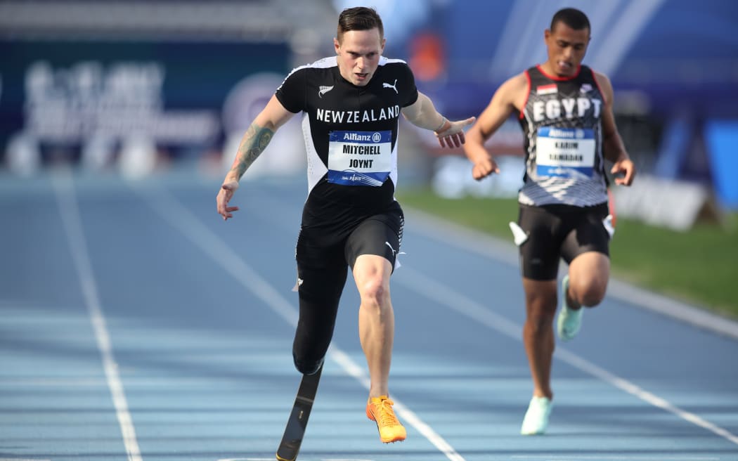 Mitch Joynt wins a bronze medal in the 200m T64 final at the para athletics world championships in Paris.