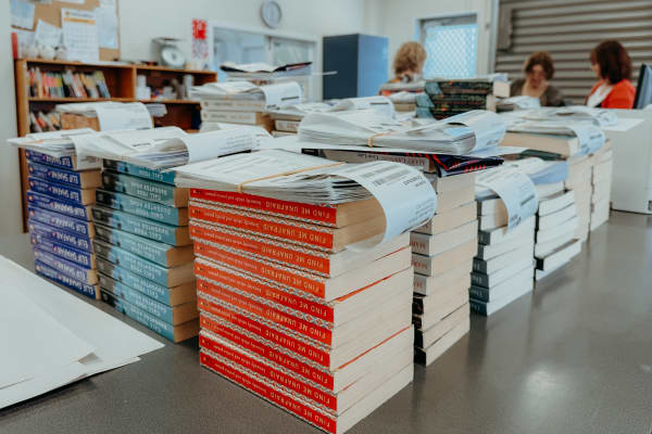 Books ready to be distributed to groups throughout the country.