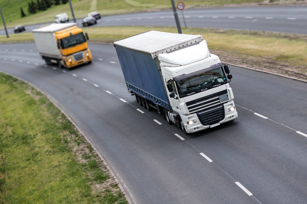 Trucks on highway.