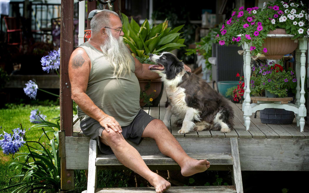 Paul Gibbs and his border collie Molly two months after she was attacked by dogs.