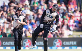 Luke Ronchi pulls up injured while chasing after a loose ball.