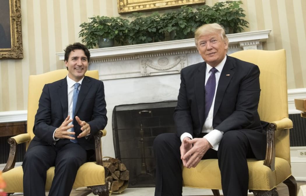 Donald Trump and Justin Trudeau meet in the Oval Office at the White House.