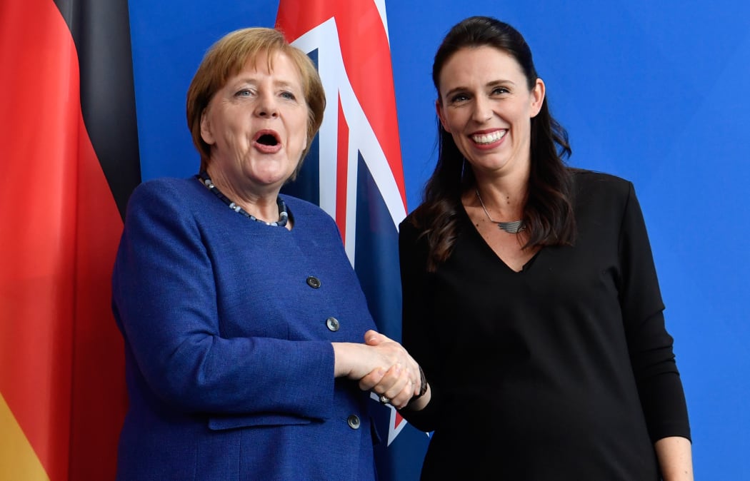 German Chancellor Angela Merkel shakes hands with Prime Minister Jacinda Ardern following a joint press conference on 17 April in Berlin.