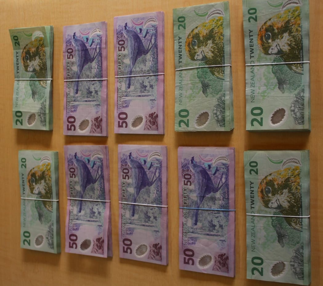 Thousands of dollars in cash was recovered today, in addition to more than $120,000 in cash during previous weeks, said police.