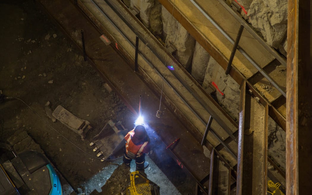 A welder working on the City Rail Link project