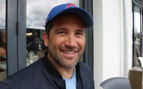 Man in blue cap