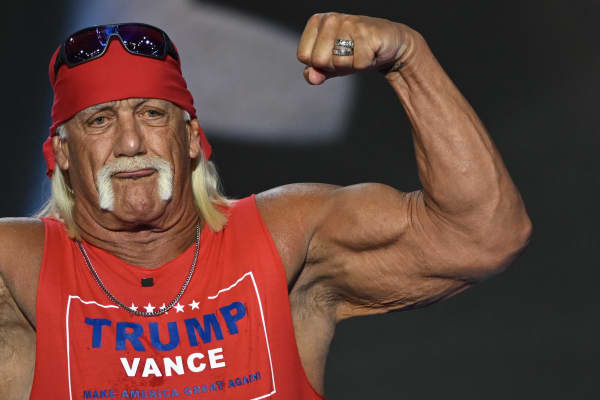 US pro-wrestler Hulk Hogan flexes his muscles after speaking at a 2024 Republican National Convention.
