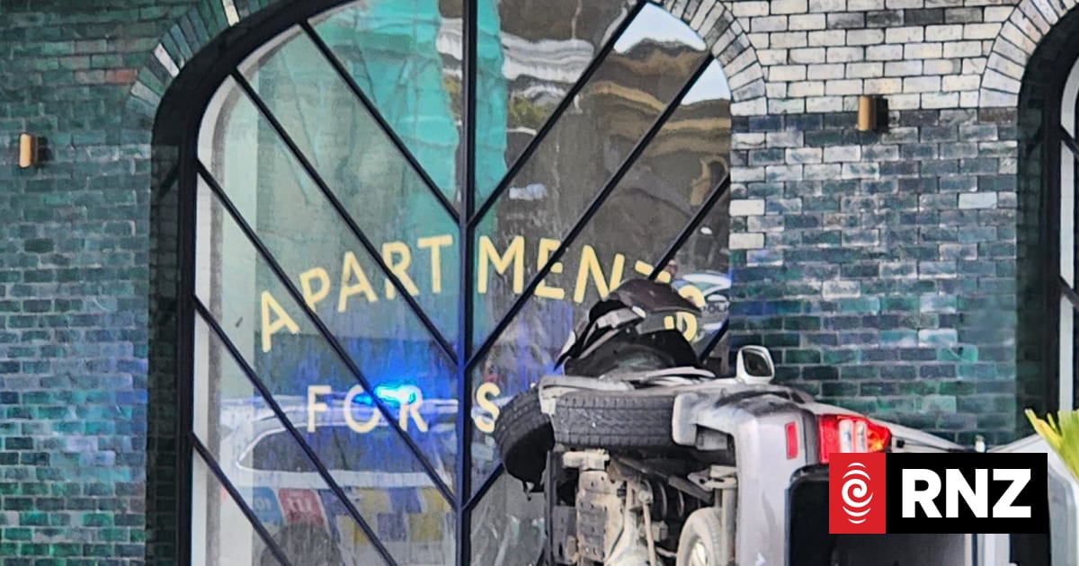 One person seriously injured after car crashes into Auckland apartment ...