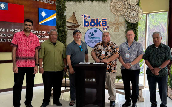 In one of two landmark cooperation agreements signed this week in Majuro during the Micronesian Island Forum, Nauru Airlines and Air Marshall Islands signed a memorandum of understanding to foster more collaboration on services. Pictured at the signing, from left: Air Marshall Islands Chief Financial Officer Roneel Sharma, Marshall Islands Transportation Minister Hilton Kendall, AMI Chairman Bobby Muller, Nauru Airlines Chairman Charleston Deiye, Nauru Airlines Commercial Manager James Blake, and AMI CEO Albon Jelke.