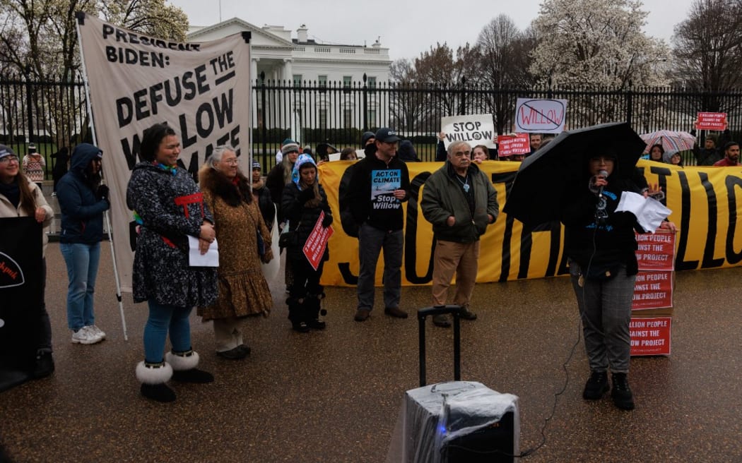 Demonstrators gather near the White House in Washington, D.C. on March 3, 2023, demanding that President Biden stop the Willow Master Development Plan, an oil drilling project planned to begin in Alaska. (Photo by Bryan Olin Dozier/NurPhoto) (Photo by Bryan Olin Dozier / NurPhoto / NurPhoto via AFP)
