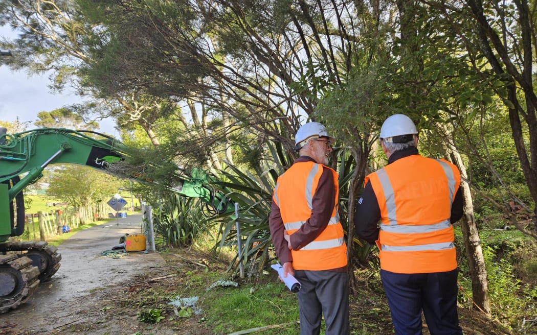 Minister for Emergency Management and Recovery Mark Mitchell (right) announced $2 million for Auckland's clean-up from extreme weather events alongside Mayor Wayne Brown (left) at the Opanuku Stream in Henderson on 24 May, 2024.