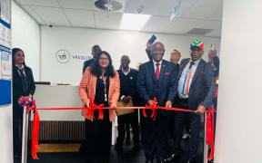 Johnny Sexwale (centre) opens the new Auckland centre.