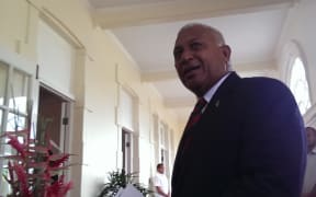Frank Bainimarama arrives for his swearing in ceremony at Government House in Suva after his landslide victory at the 2014 election