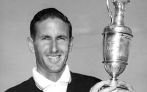 Sir Bob Charles holding the British Open Golf trophy in 1963.