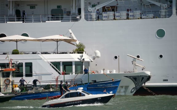 The MSC cruise ship Opera is seen after the collision with a tourist boat, in Venice, Italy, Sunday,  June 2, 2019.