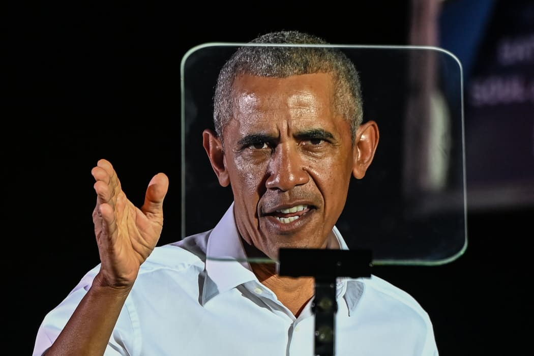 Former US President Barack Obama speaks at a drive-in rally in Miami, Florida, 2 November, 2020.