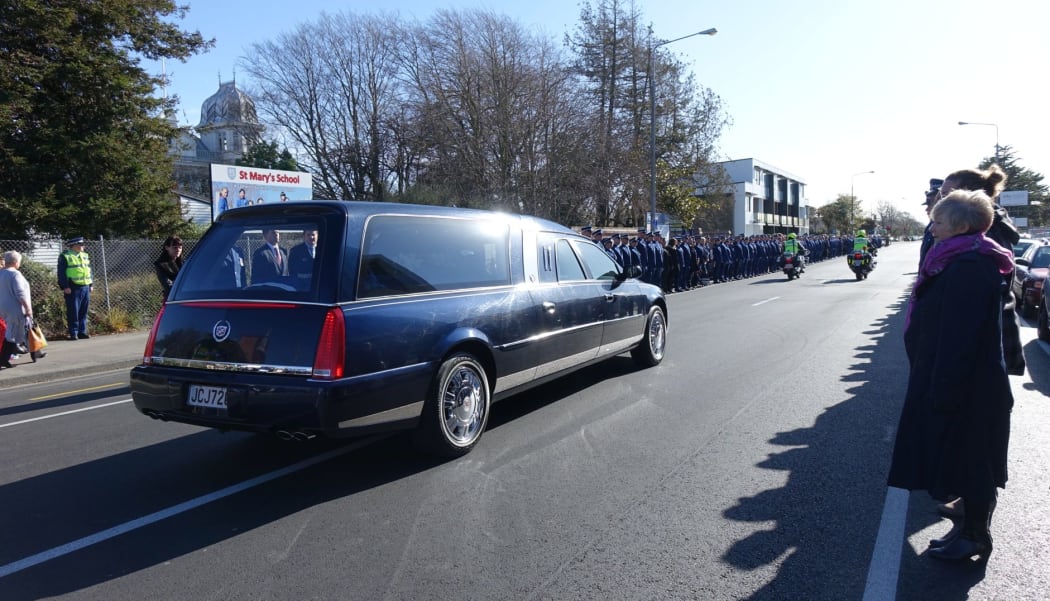 Police officers created a guard of honour for senior sergeant Richard Ryan.