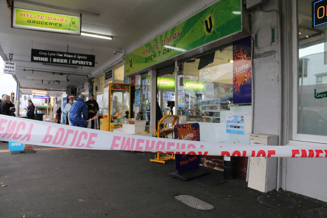 Police cordon off the scene at Grey Lynn supprette, Hylite Dairy after a mother and son were stabbed.