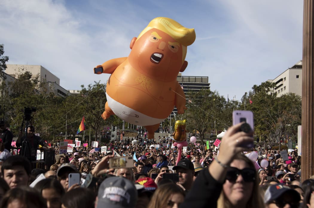 Donald Trump baby balloon at the 4th Women's March LA in Downtown. Los Angeles, January 18, 2020.