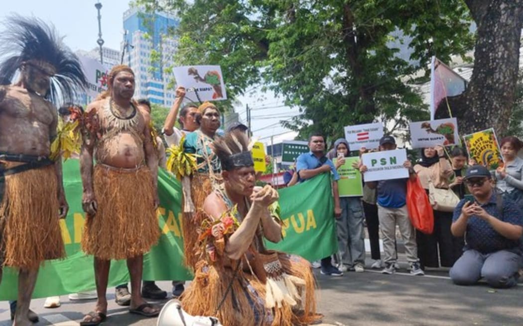 Indigenous Papuans from Merauke in eastern Indonesia protest against plans to convert indigenous and conservation lands into sugar cane plantations and rice fields, Oct. 16, 2024.