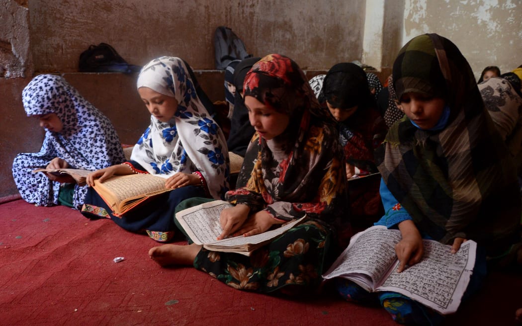 Children study inside a Madrassa or Islamic school in Kandahar on 20 April, 2022.