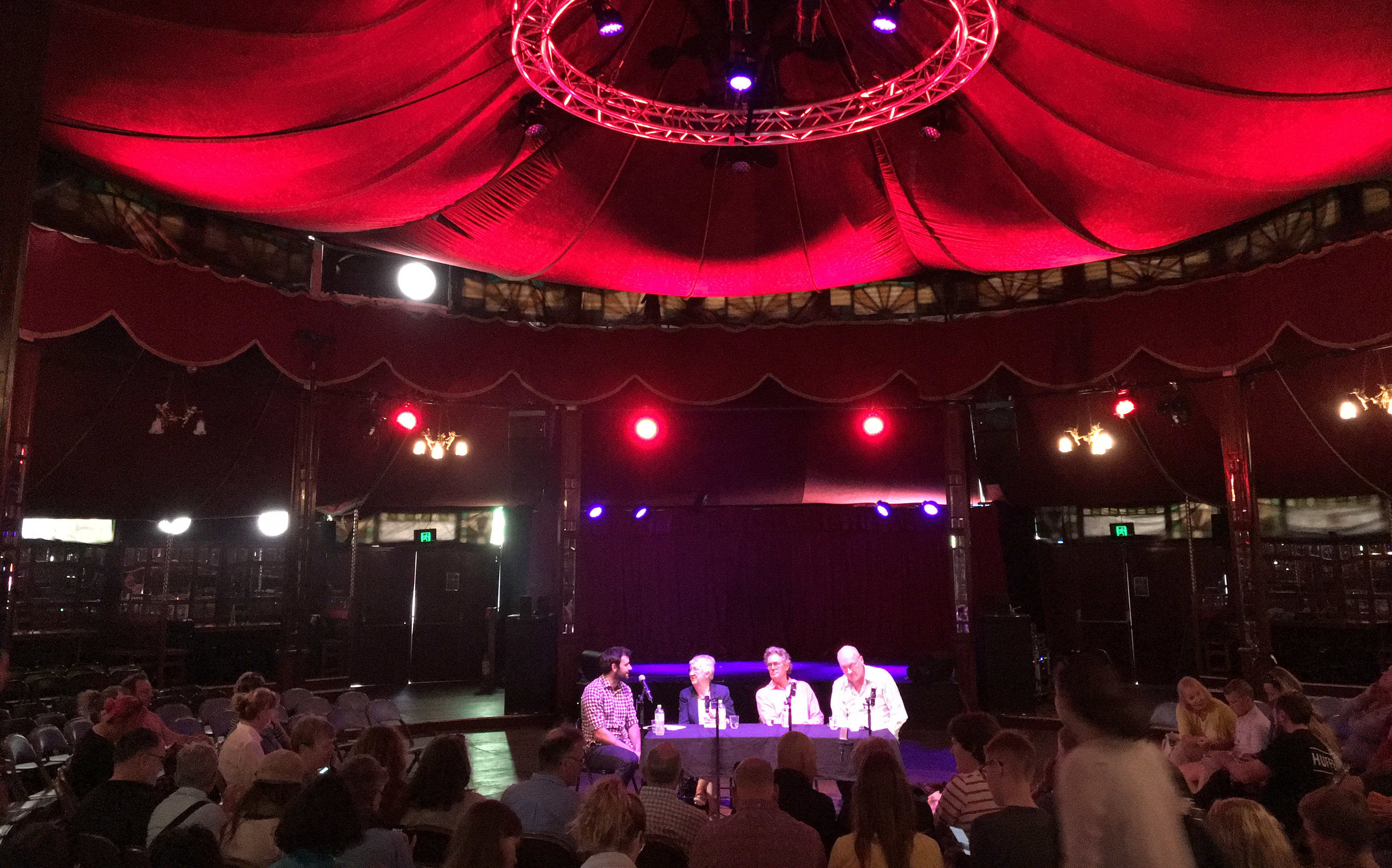 William Ray, Dame Fiona Kidman, Mark Deby and Vincent O'Malley speaking at the Bread and Circus World Busker's Festival in Christchurch