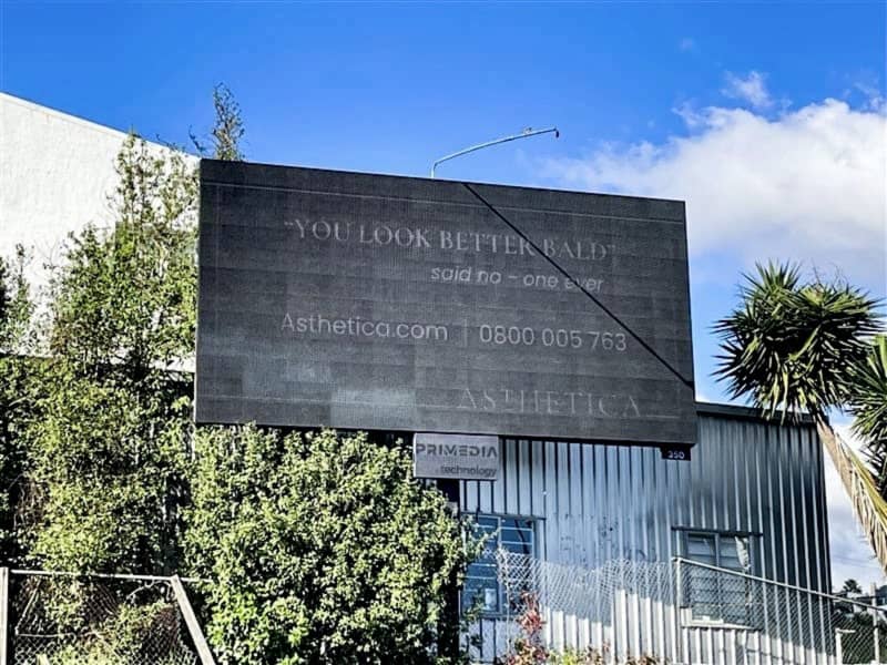 A digital billboard on display in Kingsland for Asthetica.